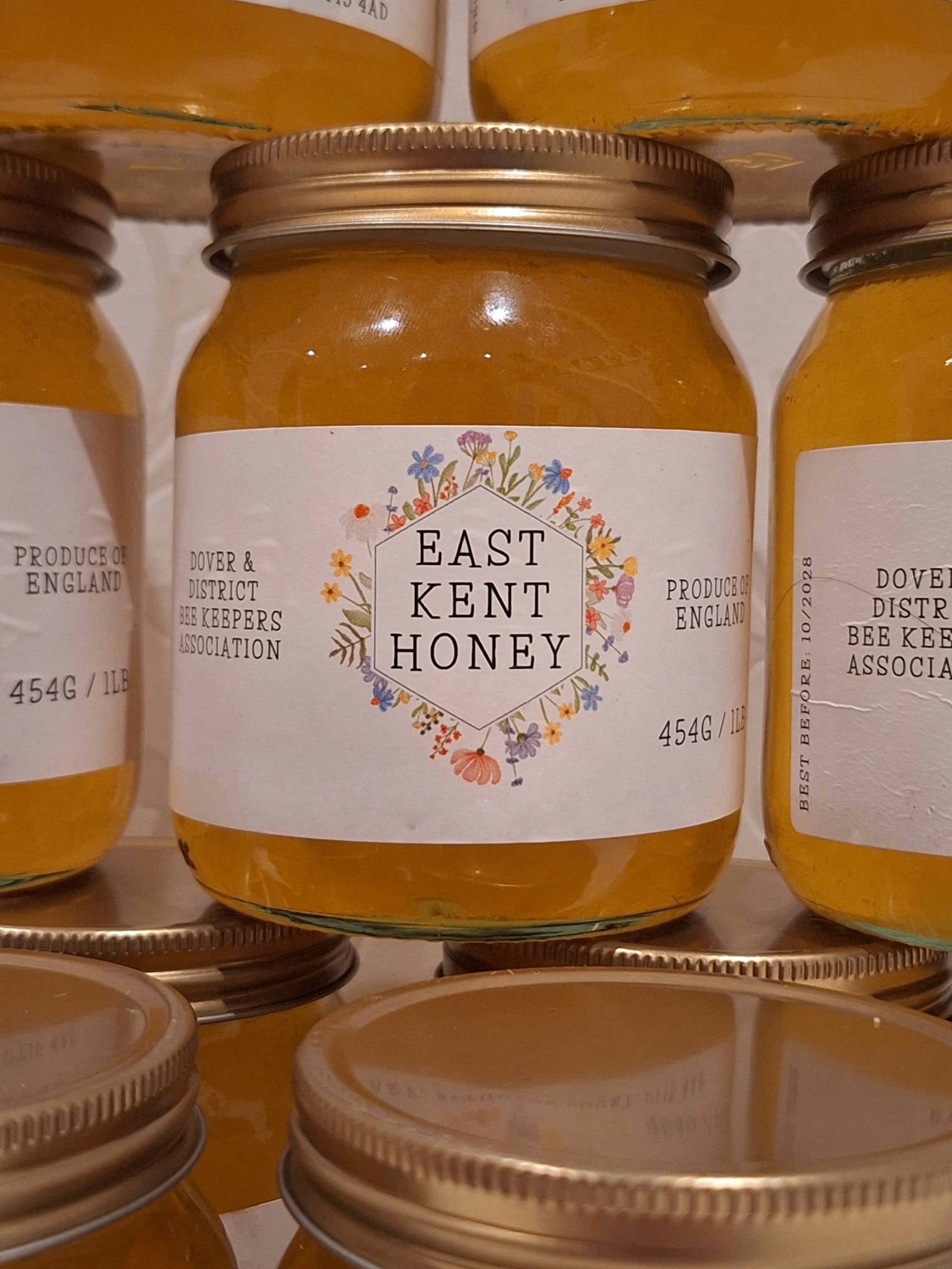 Honey in a pot and a dipper